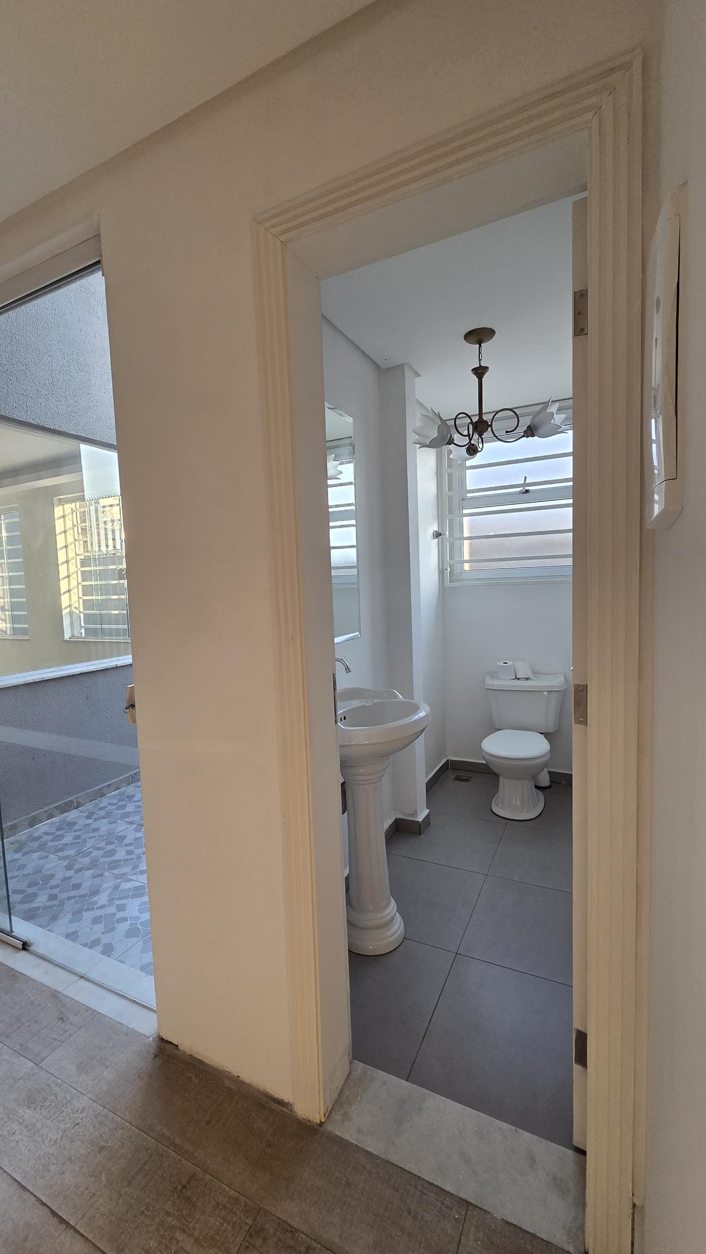Ambiente do térreo — casa triplex à venda no Ipiranga, Rua Oliveira Melo 482