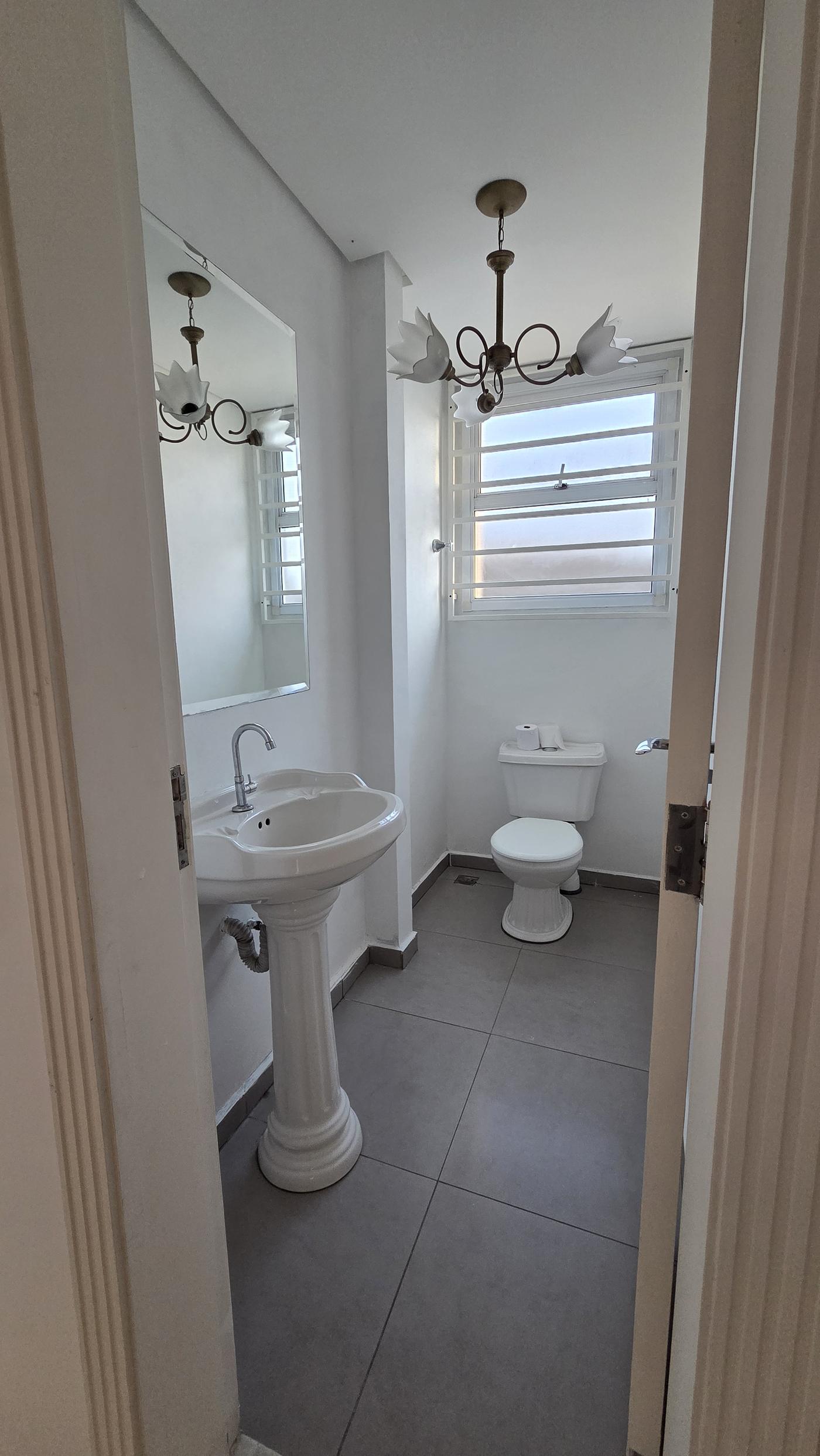 Ambiente do térreo — casa triplex à venda no Ipiranga, Rua Oliveira Melo 482